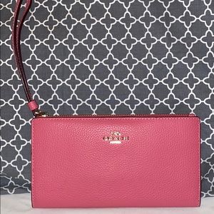 Coach wristlet wallet.